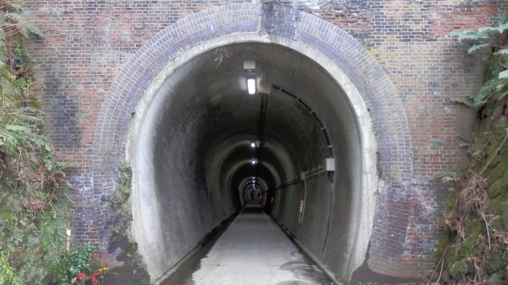 View of the entrance to a railway tunnel that has been turned into a bicycle path